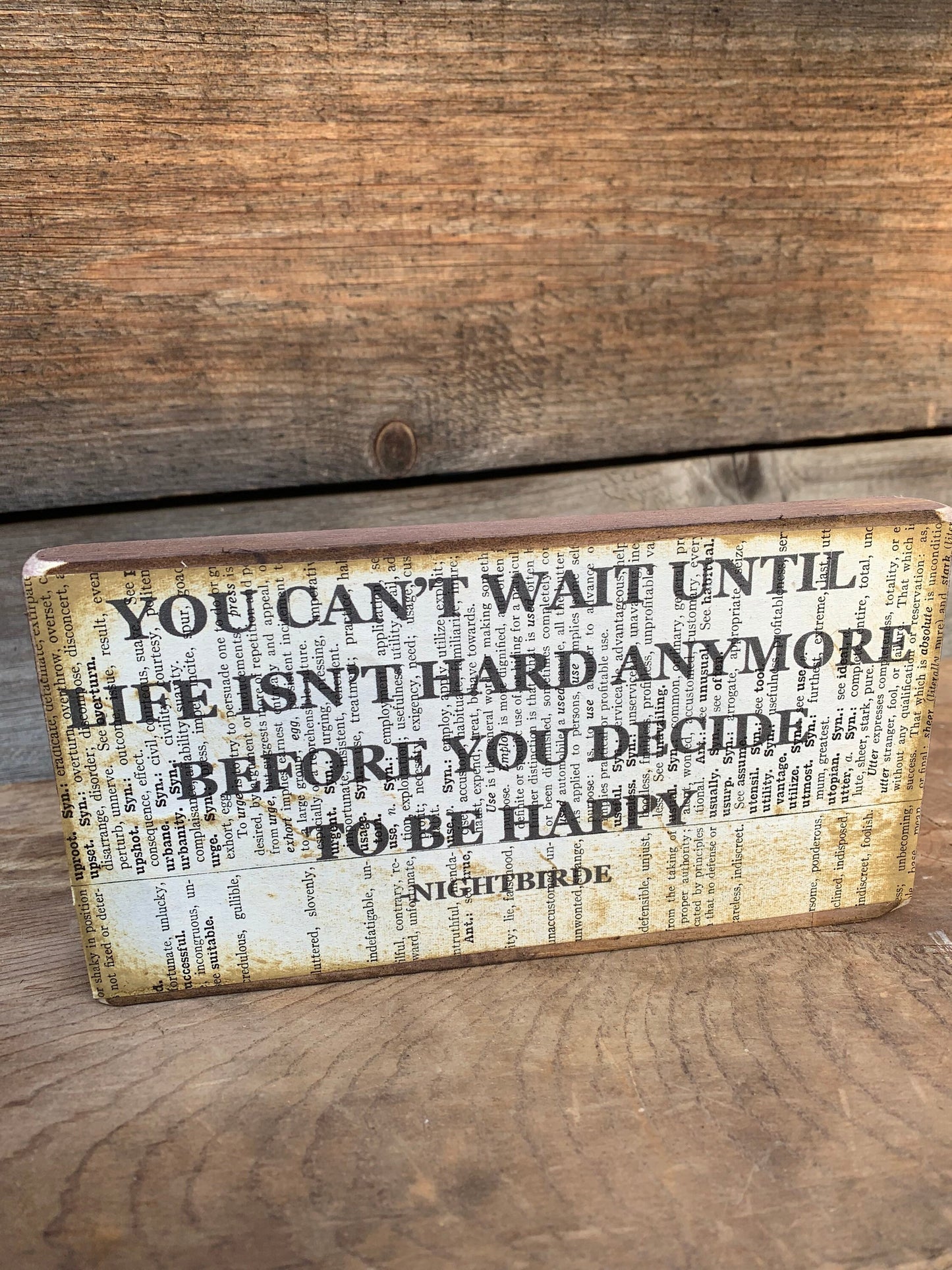 You can't wait until life isn't hard anymore before you decide to be happy Nightbirde sign